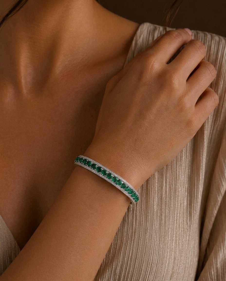 18K White Gold Emerald and Diamond Bracelet on model