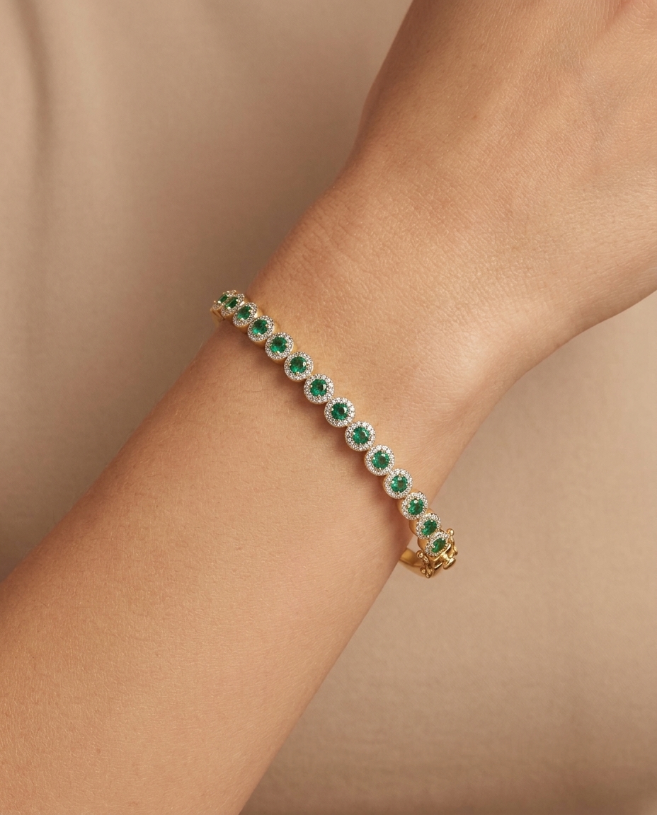 14KT Yellow Gold Emerald and Diamonds Bangle on model