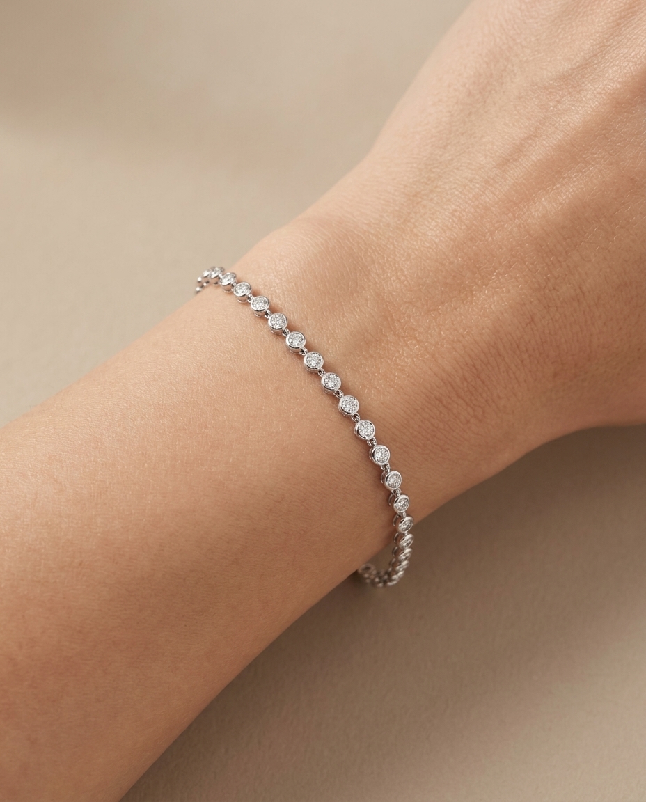 14KT Gold Bezeled Diamond Station Bracelet on model