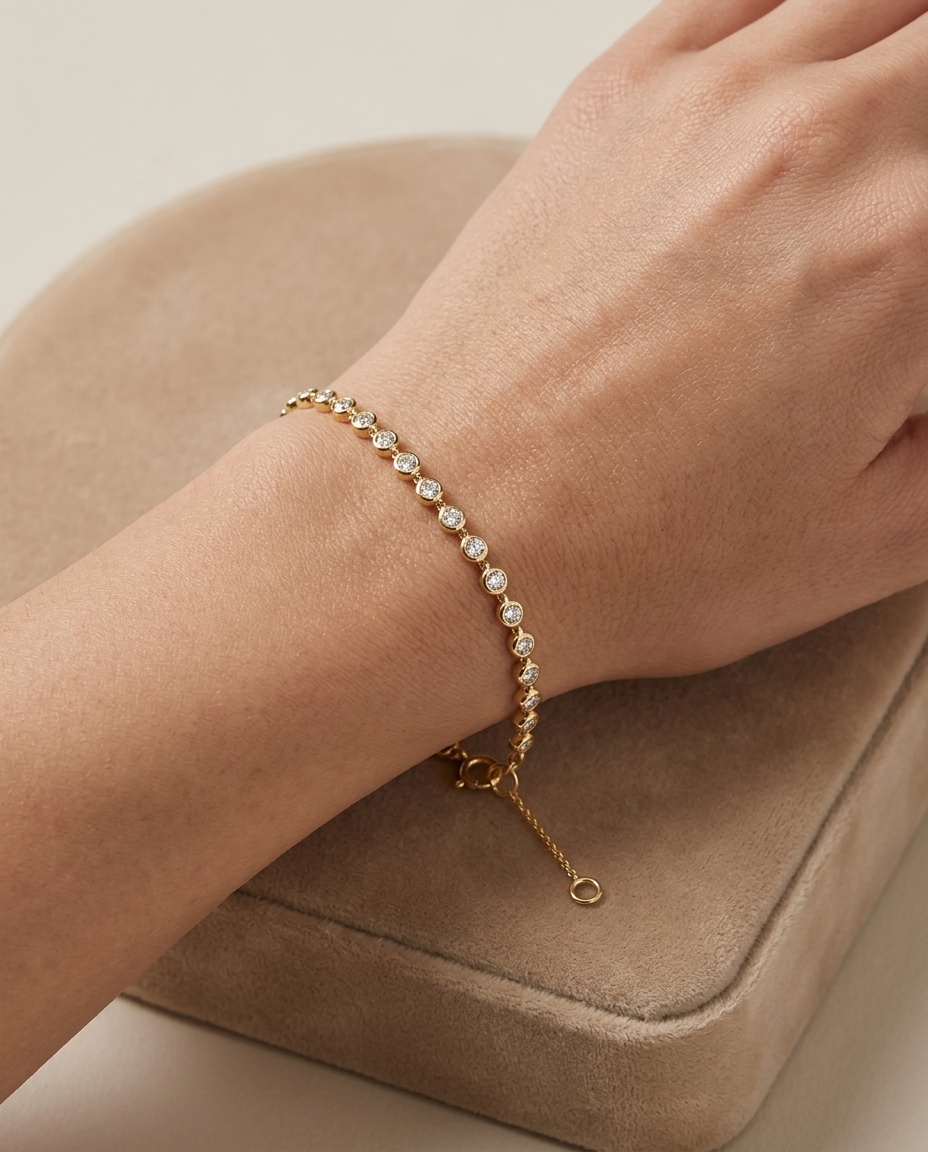 14KT Gold Bezeled Diamond Station Bracelet on model