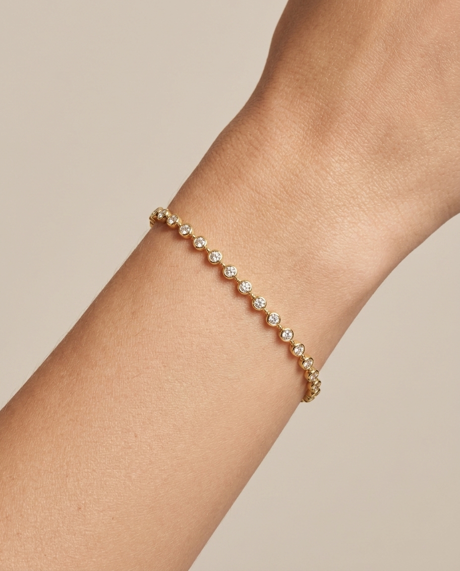 14KT Gold Bezeled Diamond Station Bracelet on model