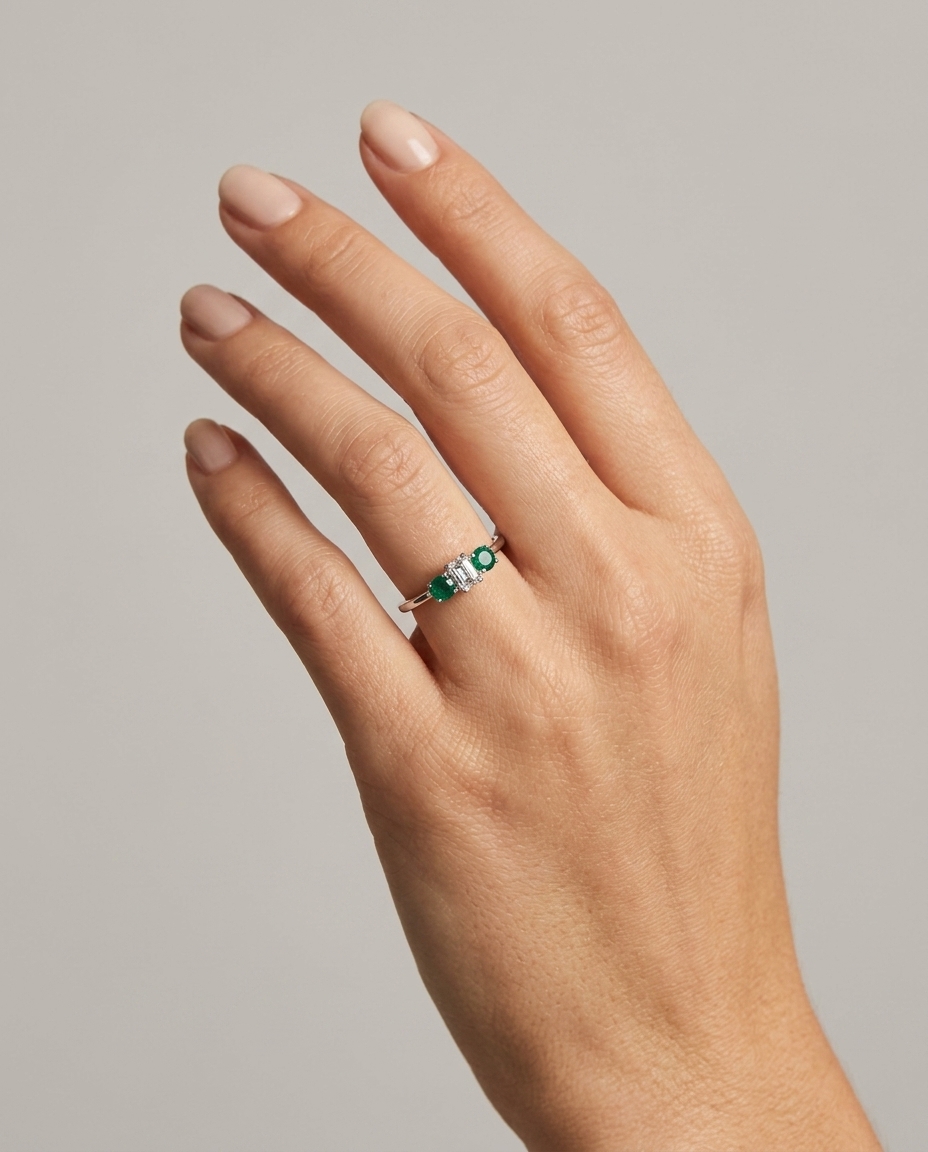 18KT White Gold Emerald and Diamond Ring on model