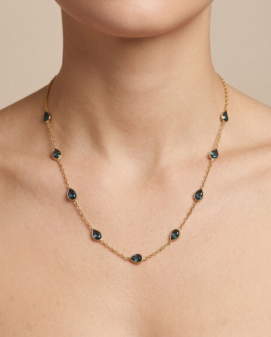 18KT Yellow Gold Bezeled Sapphire Station Necklace on model