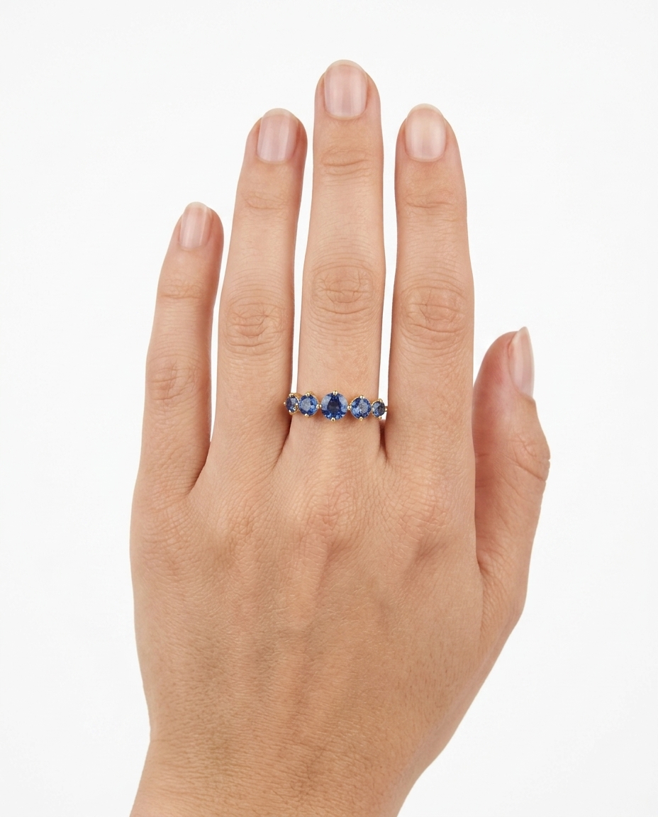 14KT Yellow Gold Blue Sapphire Ring on model