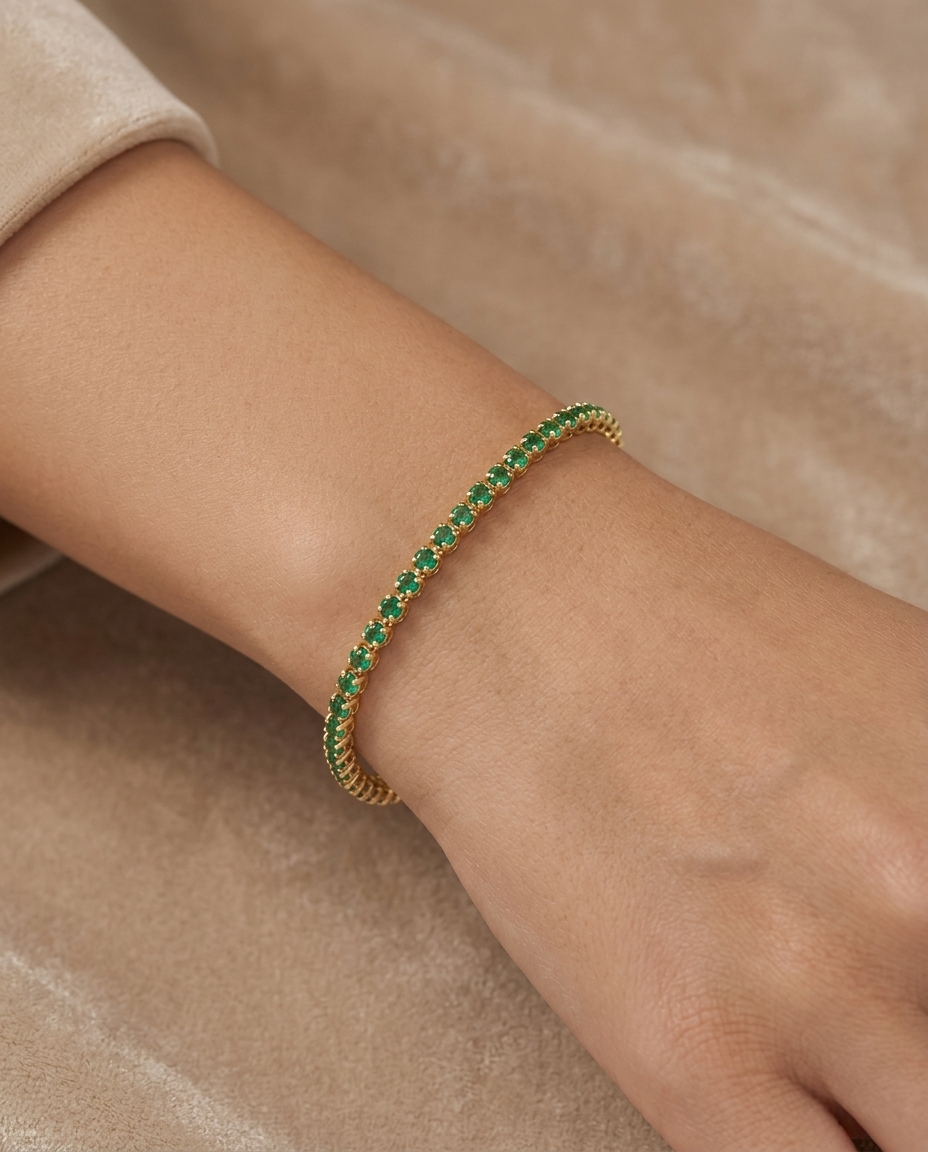 14KT Yellow Gold Emerald Tennis Bracelet on model