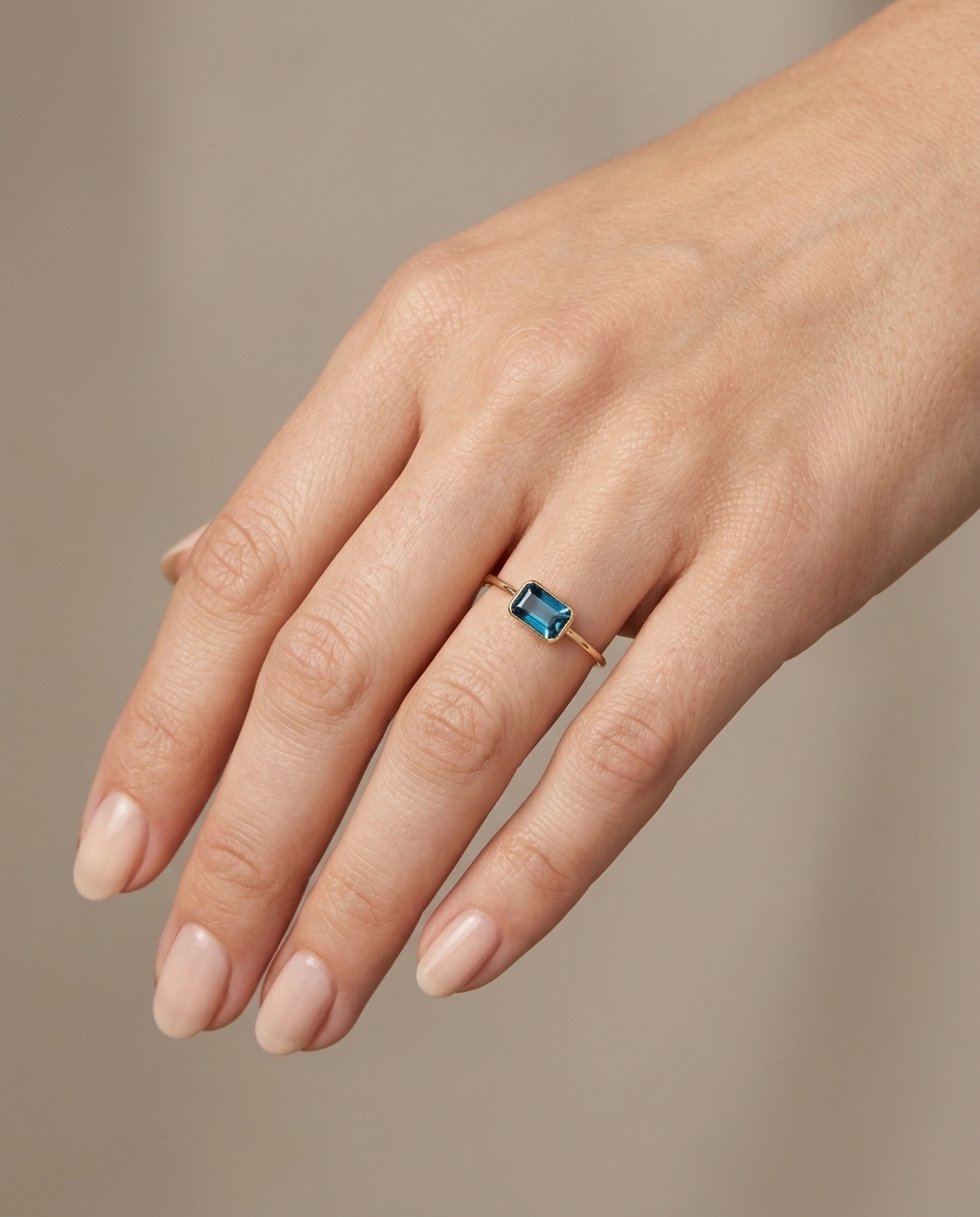 14KT Yellow Gold London Blue Topaz Ring on model