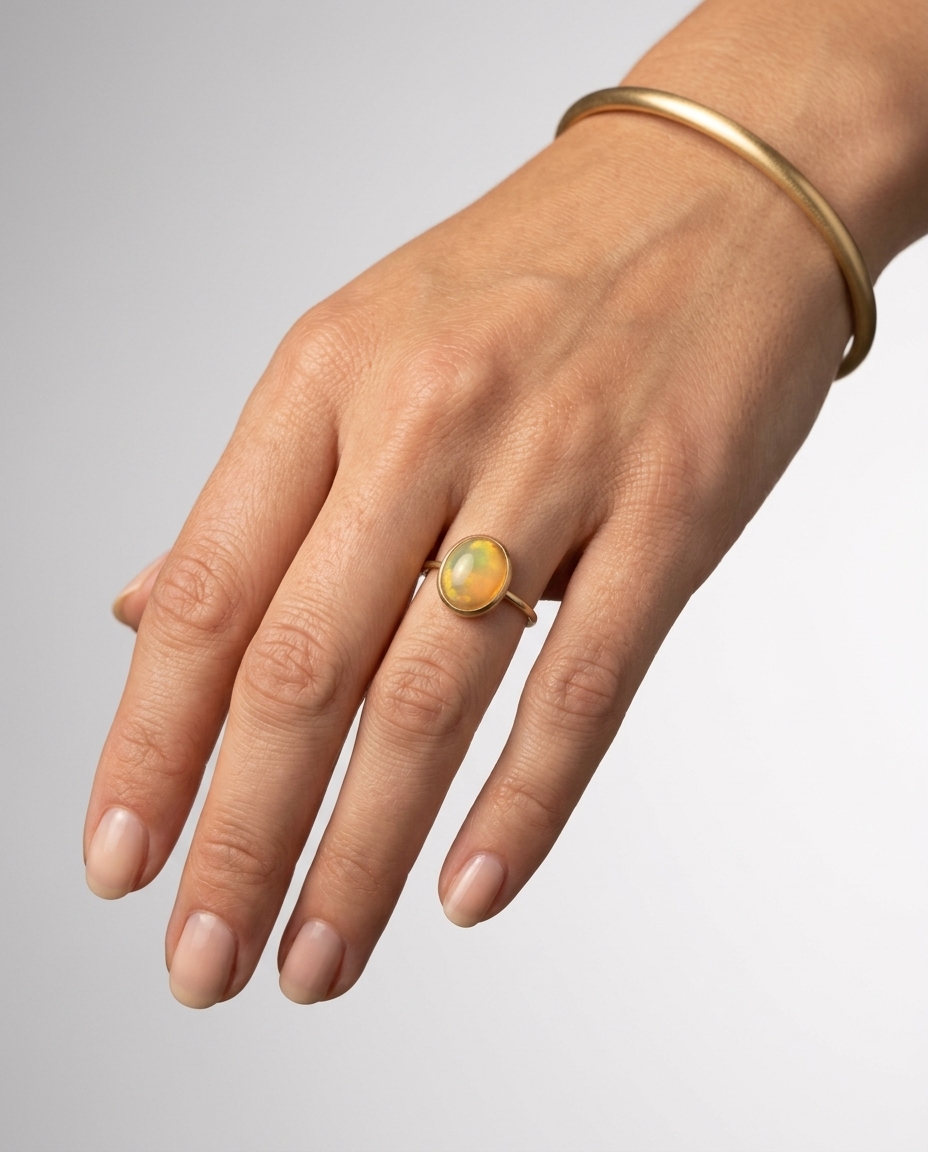 14KT Yellow Gold Opal Ring on model
