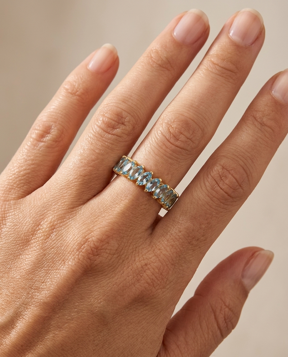14KT Yellow Gold Marquise Shape Aquamarine Eternity Band on model