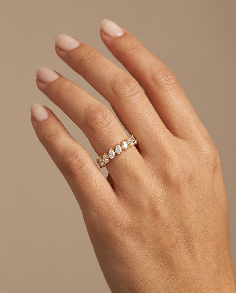 14KT Gold Ring with Pear Shape Diamonds on model