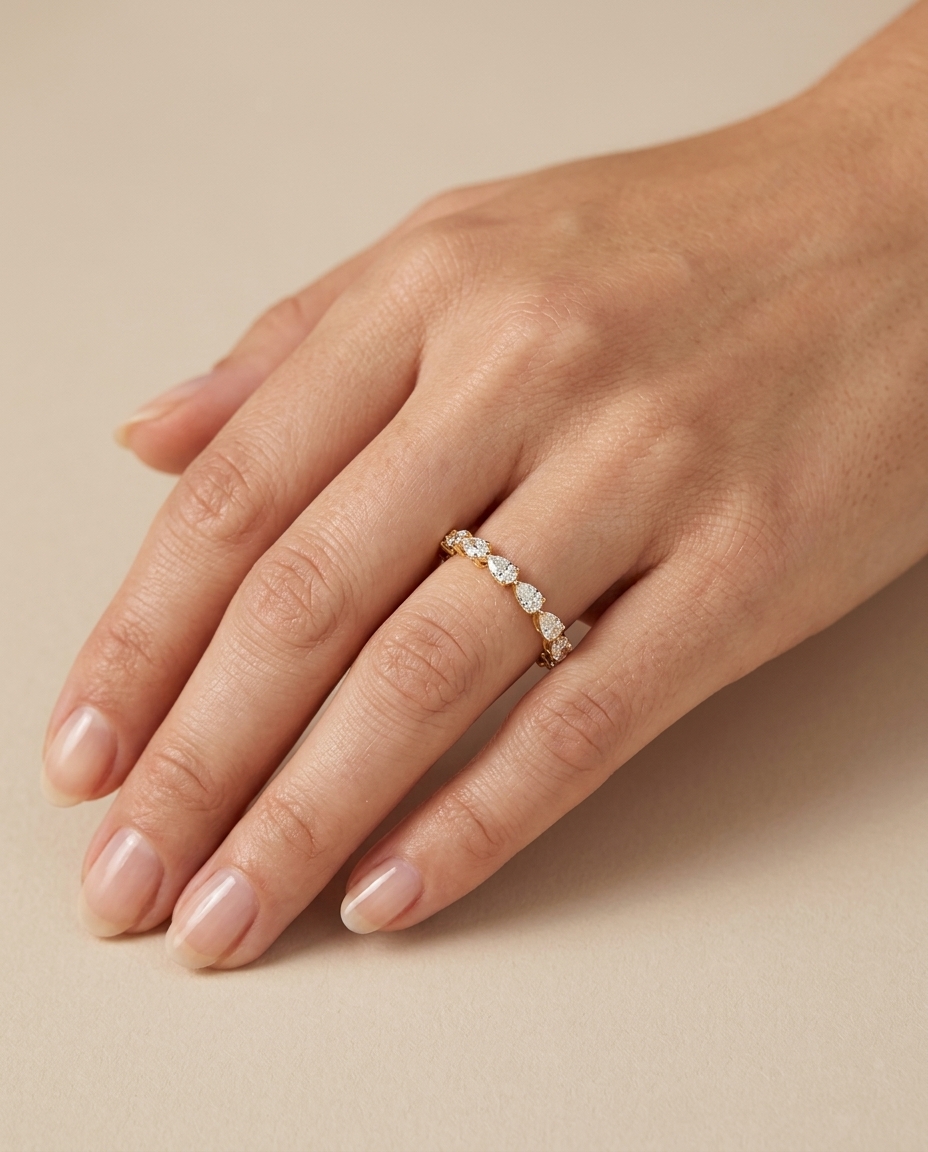 14KT Gold Ring with Pear Shape Diamonds on model