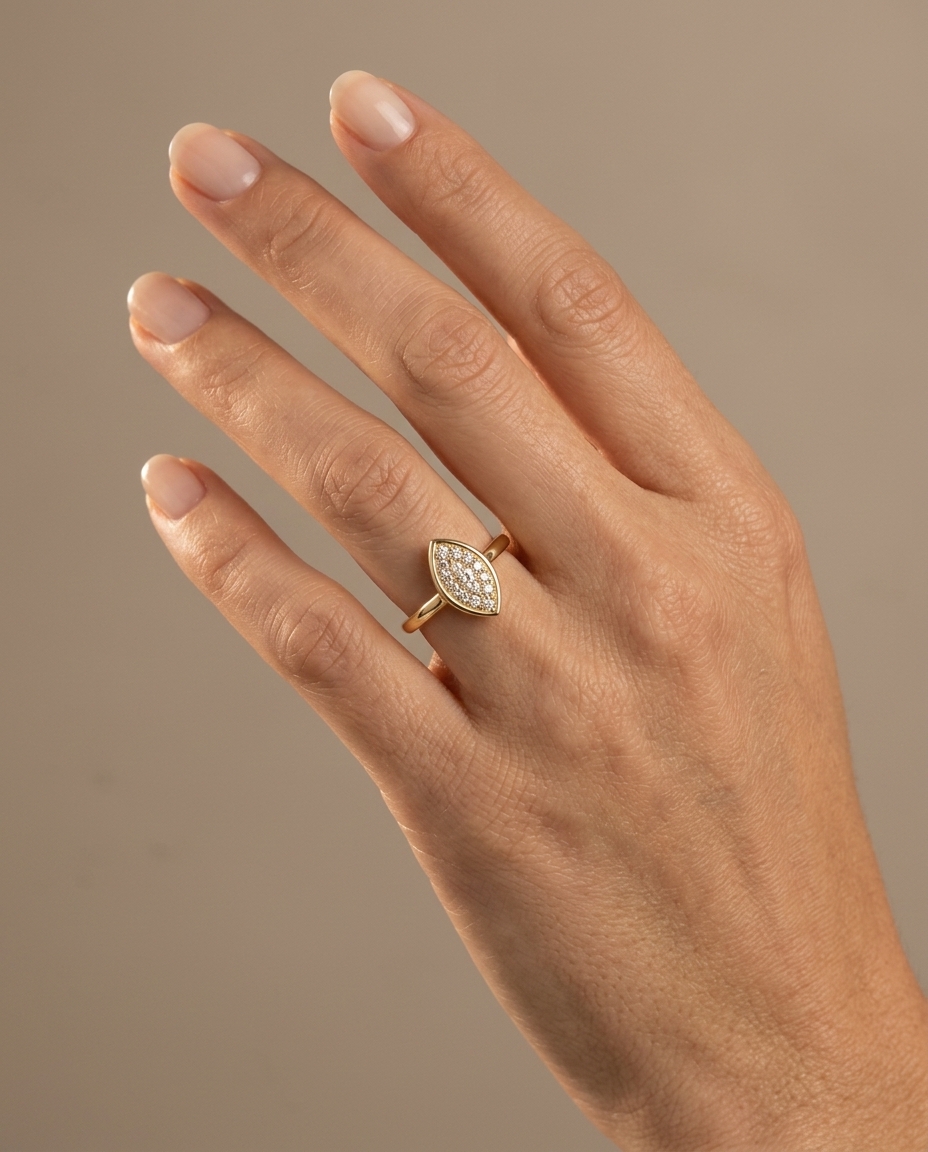 14KT Gold Ring with Single Bezeled Marquise Shape Diamond on model