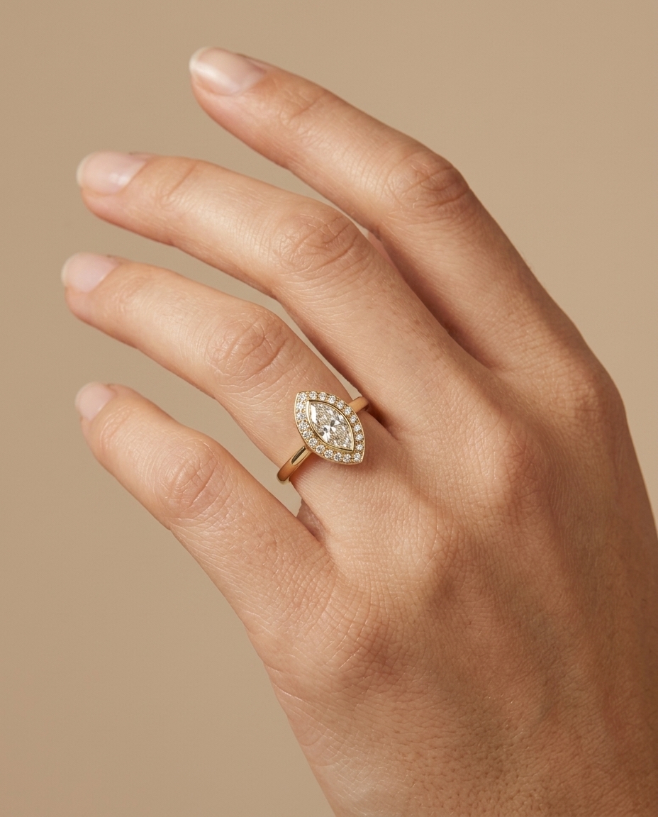 14KT Gold Ring with Single Bezeled Marquise Shape Diamond on model