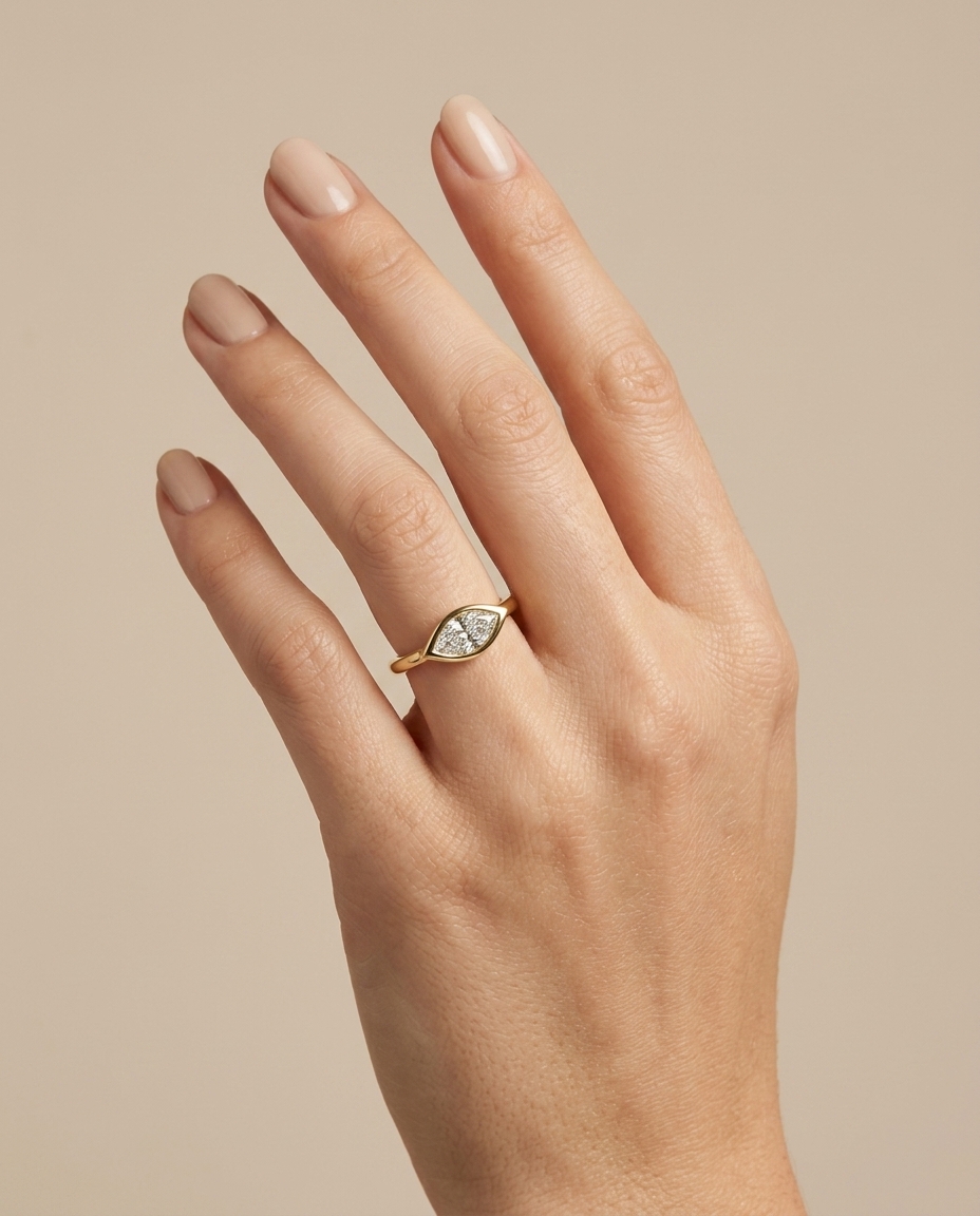 14KT Gold Ring with Single Bezeled Marquise Shape Diamond on model