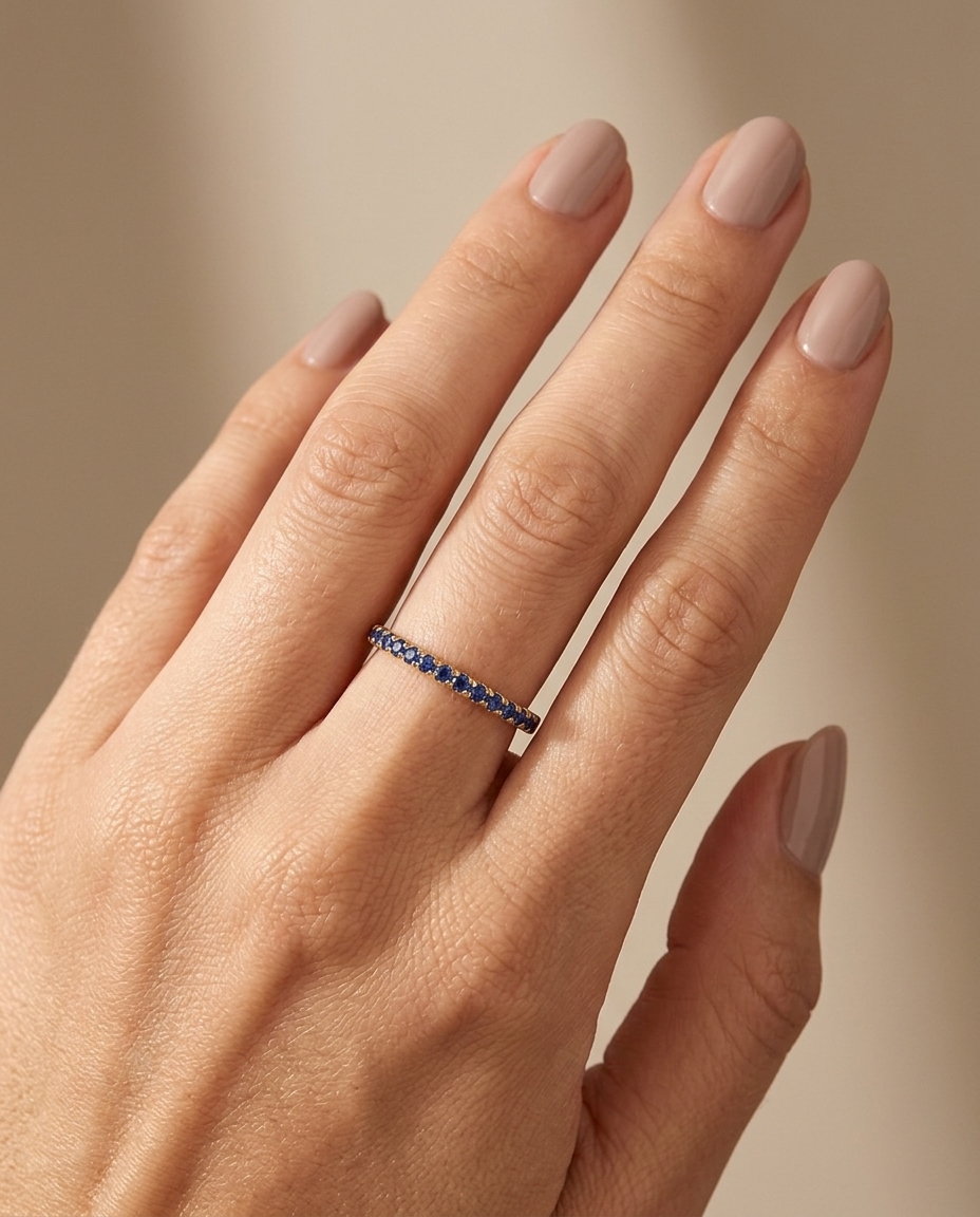 14KT Gold Full Eternity Blue Sapphire Thin Ring Band on model