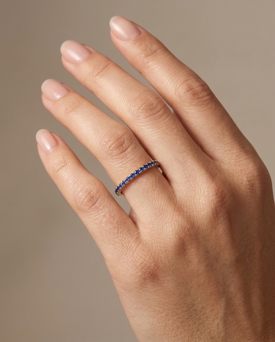 14KT Gold Full Eternity Blue Sapphire Thin Ring Band on model