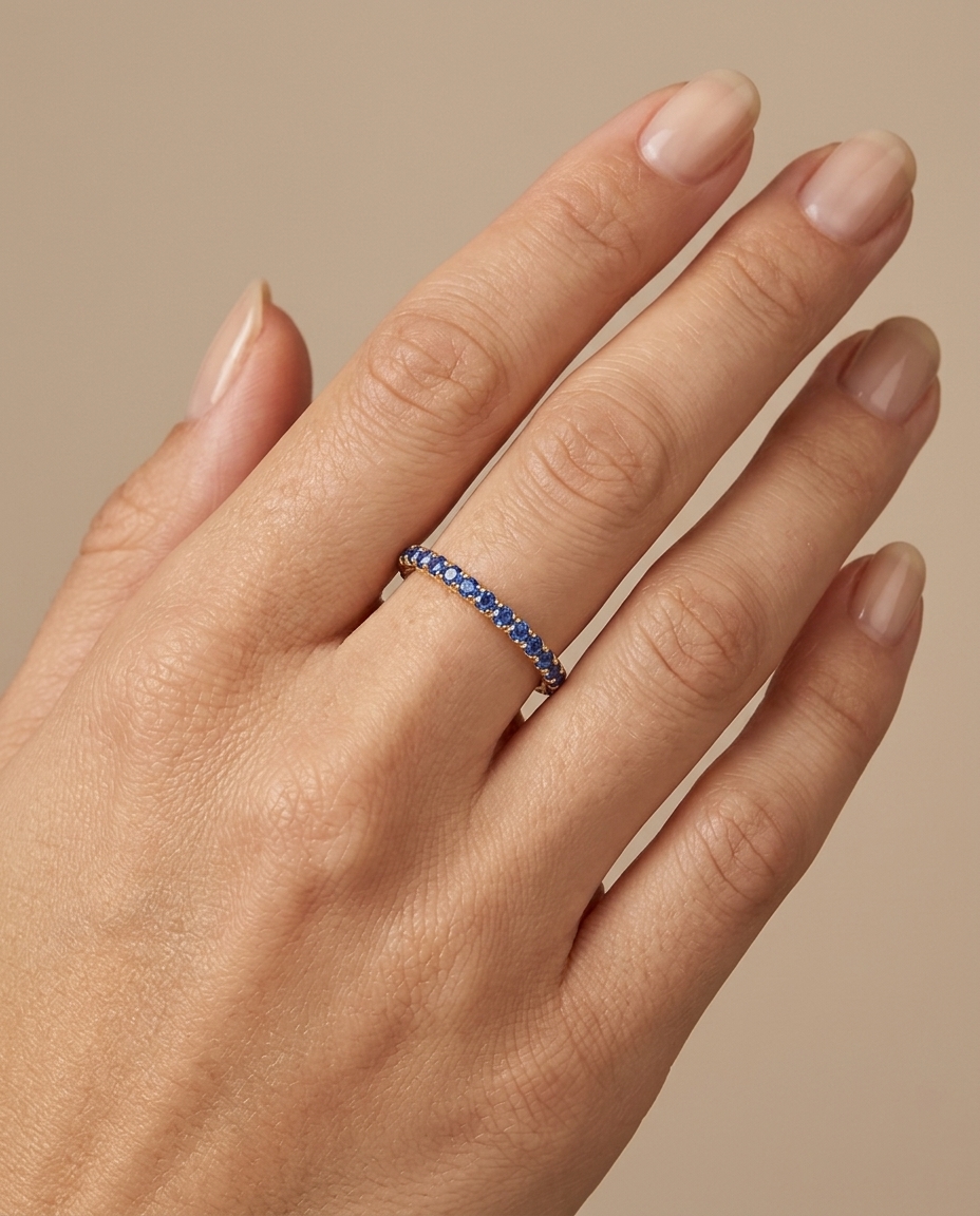 14KT Gold Full Eternity Blue Sapphire Thin Ring Band on model