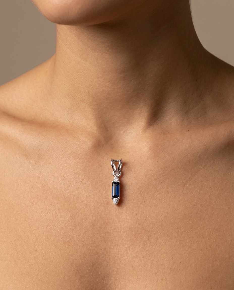 18KT White Gold Diamond and Sapphire Pendent on model