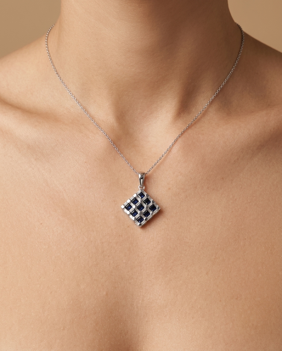 18KT White Gold Diamond and Sapphire Pendent on model