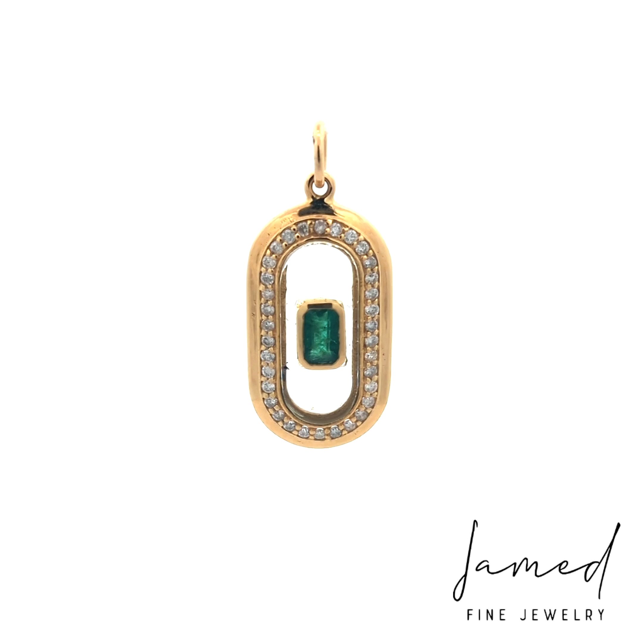 Clear Quartz Pendant with Emerald in Yellow Gold